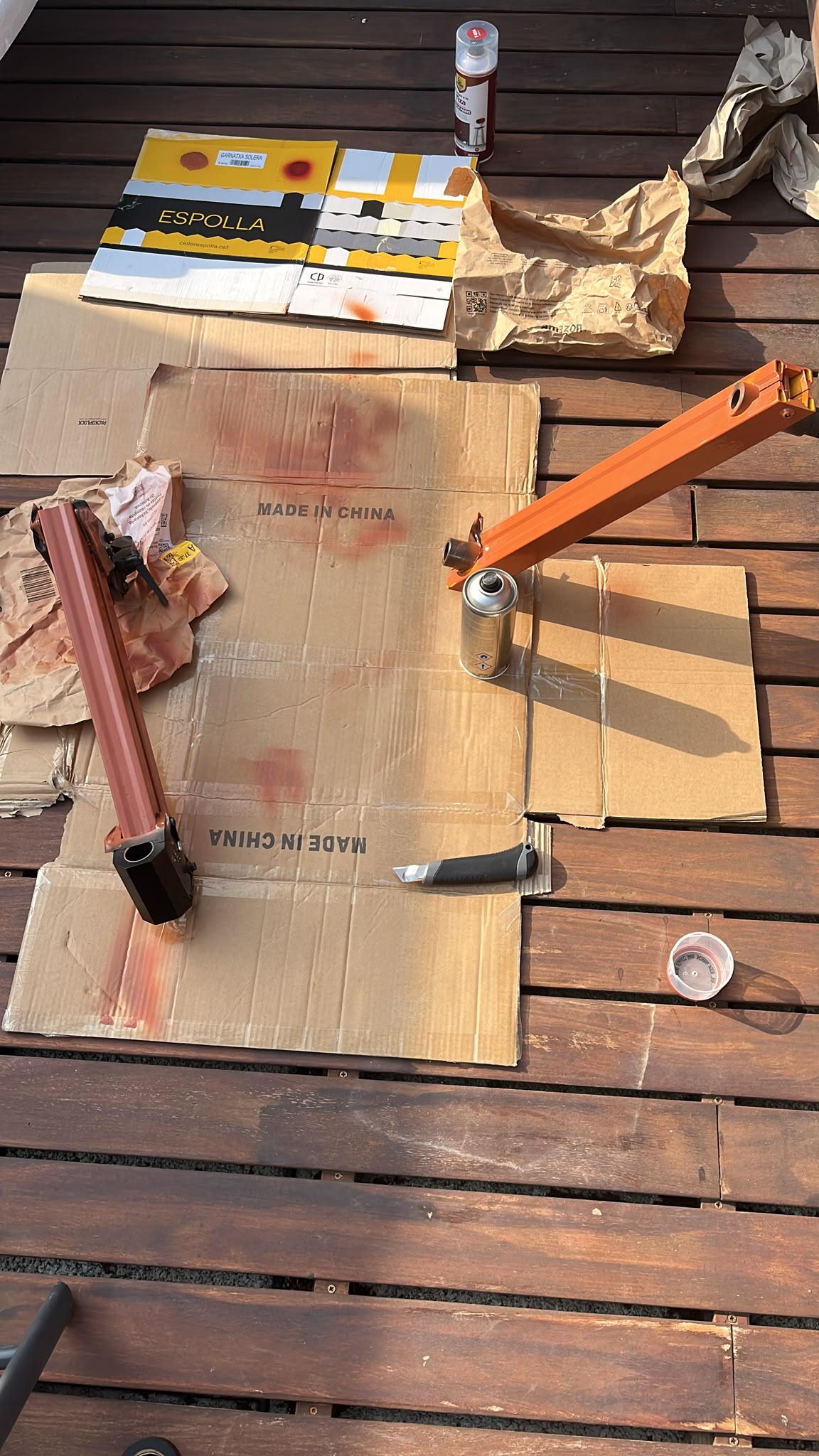 Painting structural arm components
