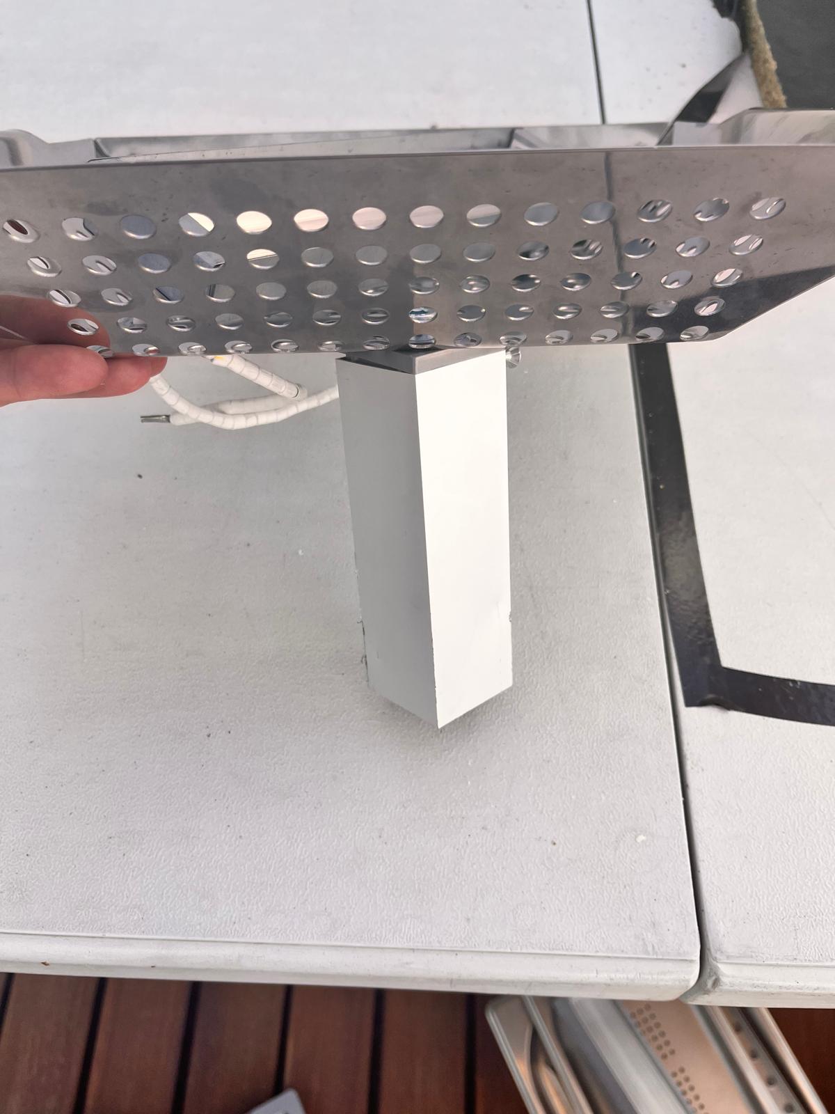 Structural adapter under reflector