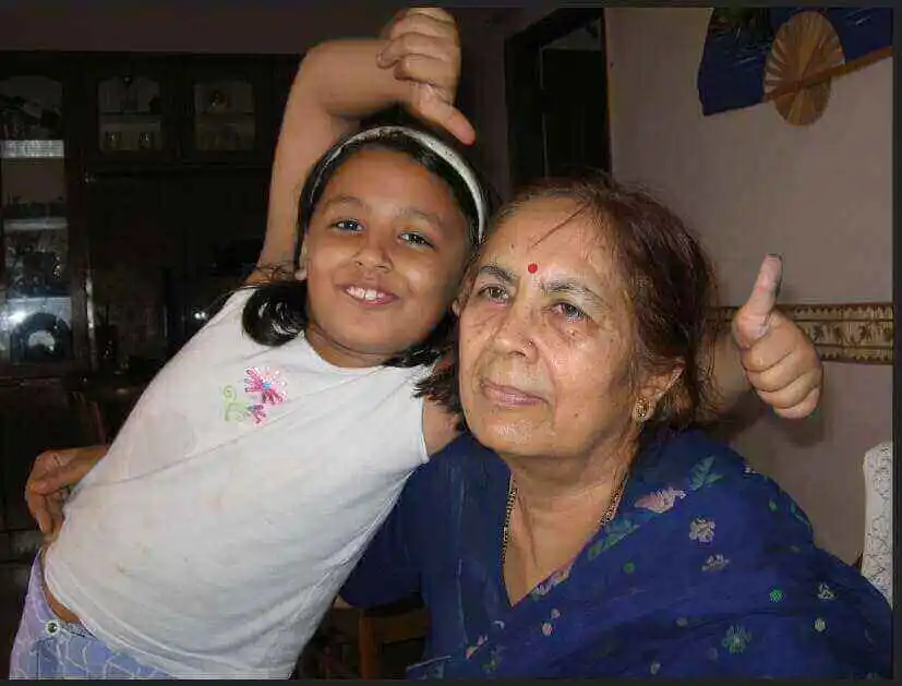Young Shiv with grandmother Maya