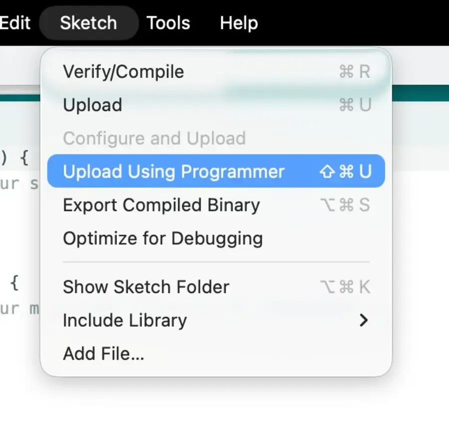 Arduino Sketch menu with Upload Using Programmer highlighted — keyboard shortcut Shift Cmd U