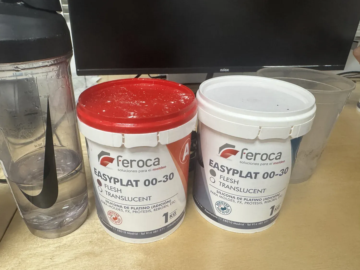 Two tubs of Feroca EasyPlat 00-30 flesh translucent two-part silicone