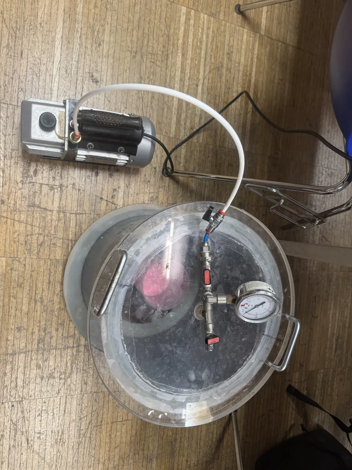 The mixed silicone in a vacuum degassing chamber