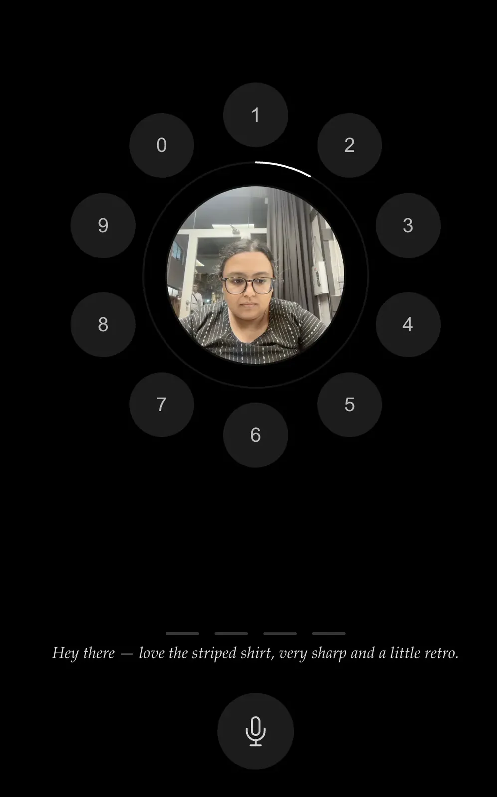 The live Adoora interface — a face in the camera orb, a keypad ring of digits 0–9, and a subtitle line commenting on the visitor