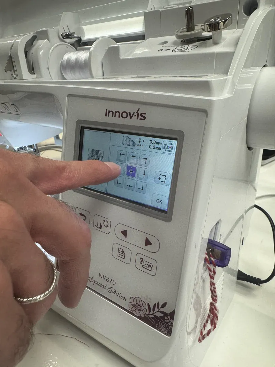Machine touchscreen showing design positioning controls