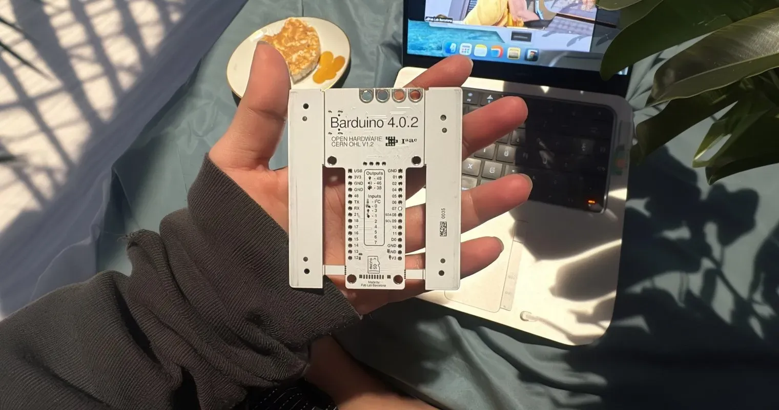 Barduino 4.0.2 board held in hand, showing pinout labels