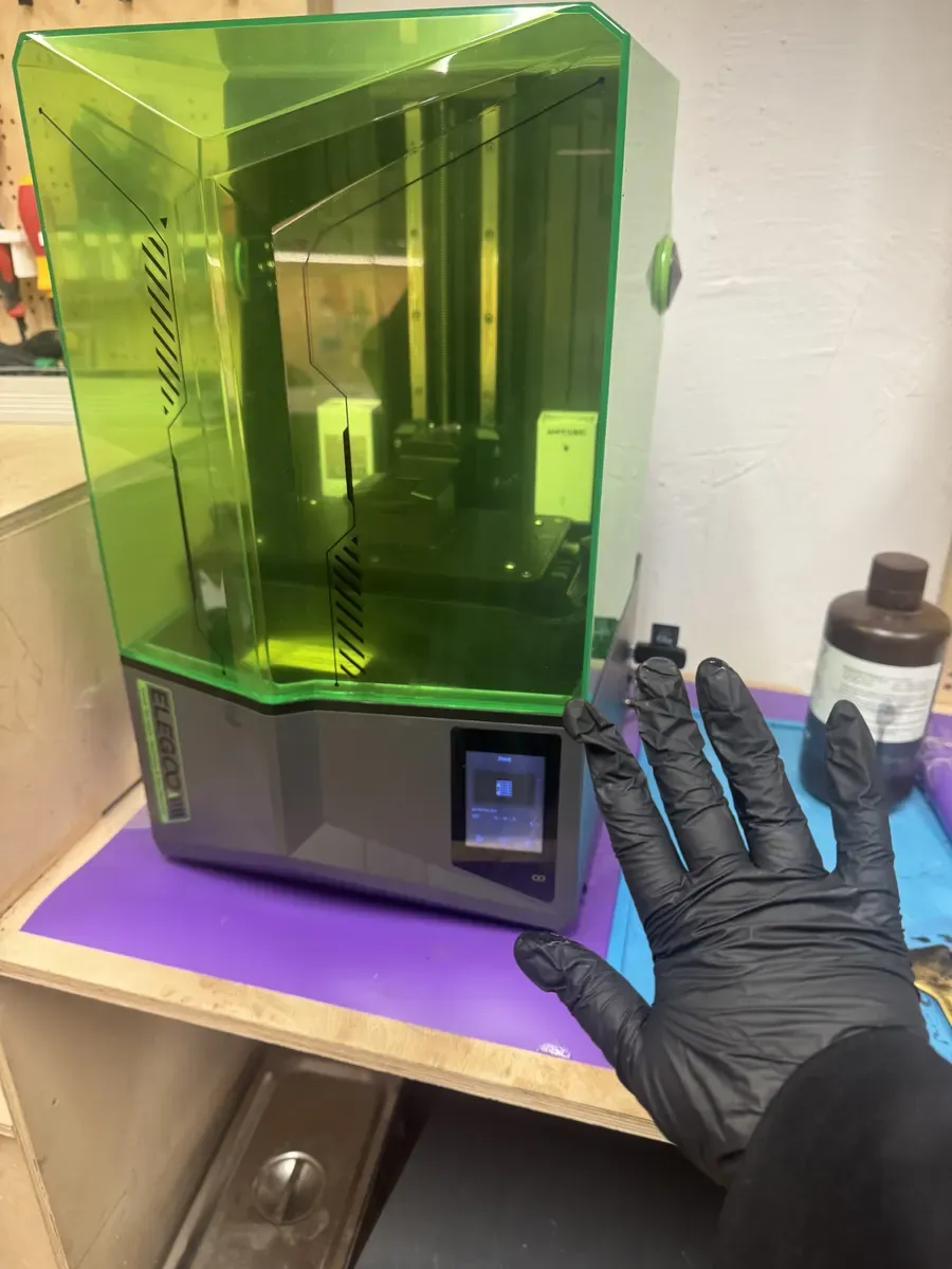 ELEGOO Saturn 4 resin printer with green UV cover at Fab Lab Barcelona