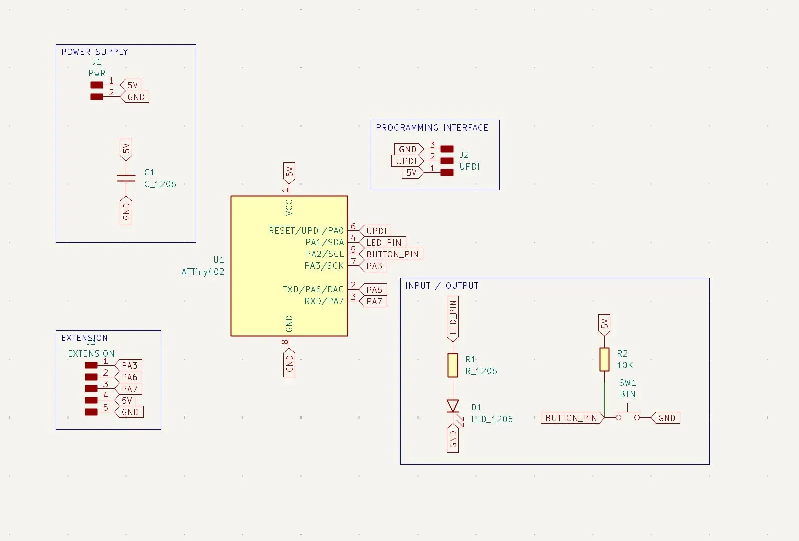 Full KiCad schematic of ATtiny402 board with power supply, UPDI programming interface, LED, button, and extension connector