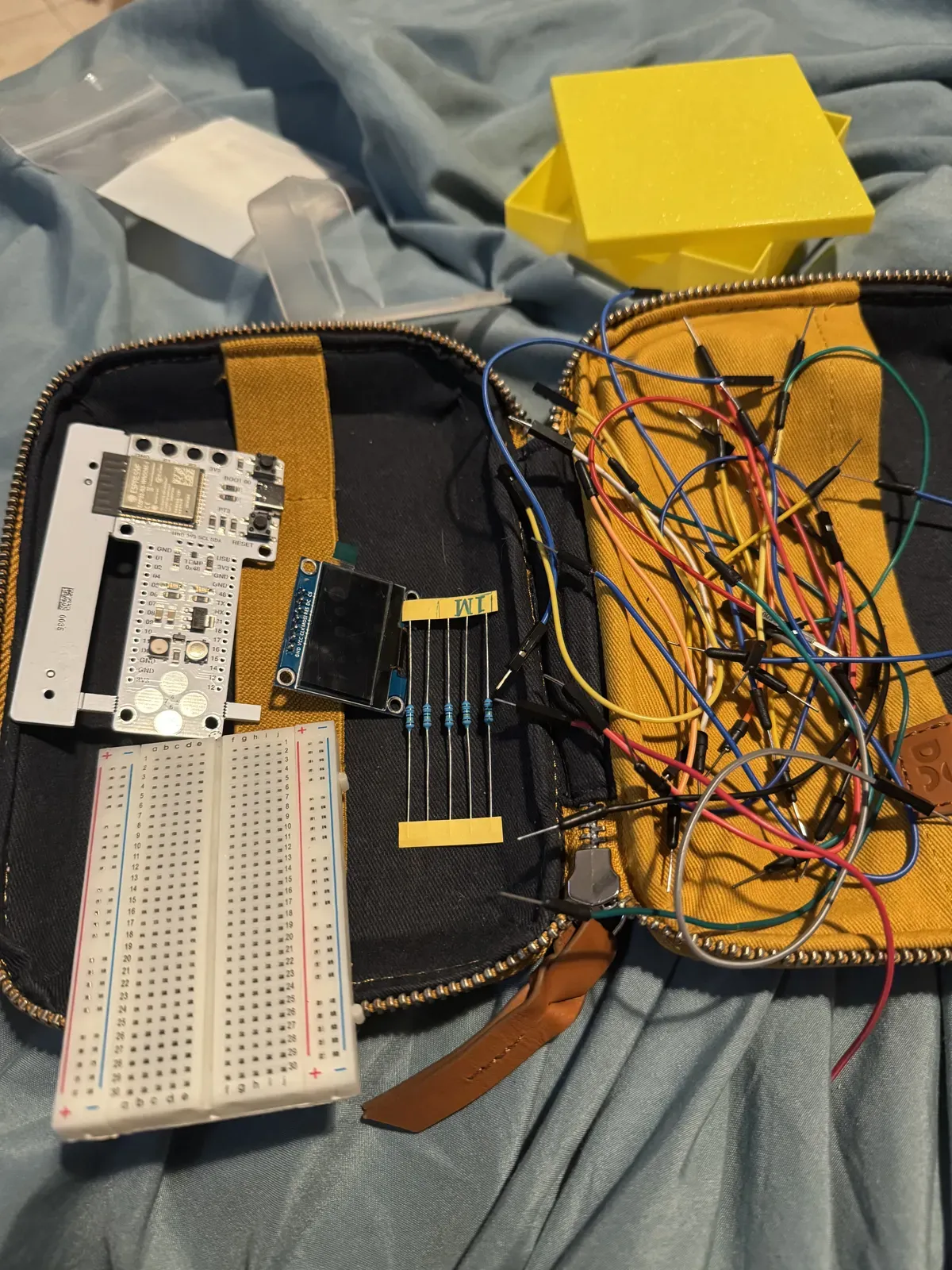 Electronics kit with Barduino, OLED display, breadboard, resistors, NFC tags, and jumper wires