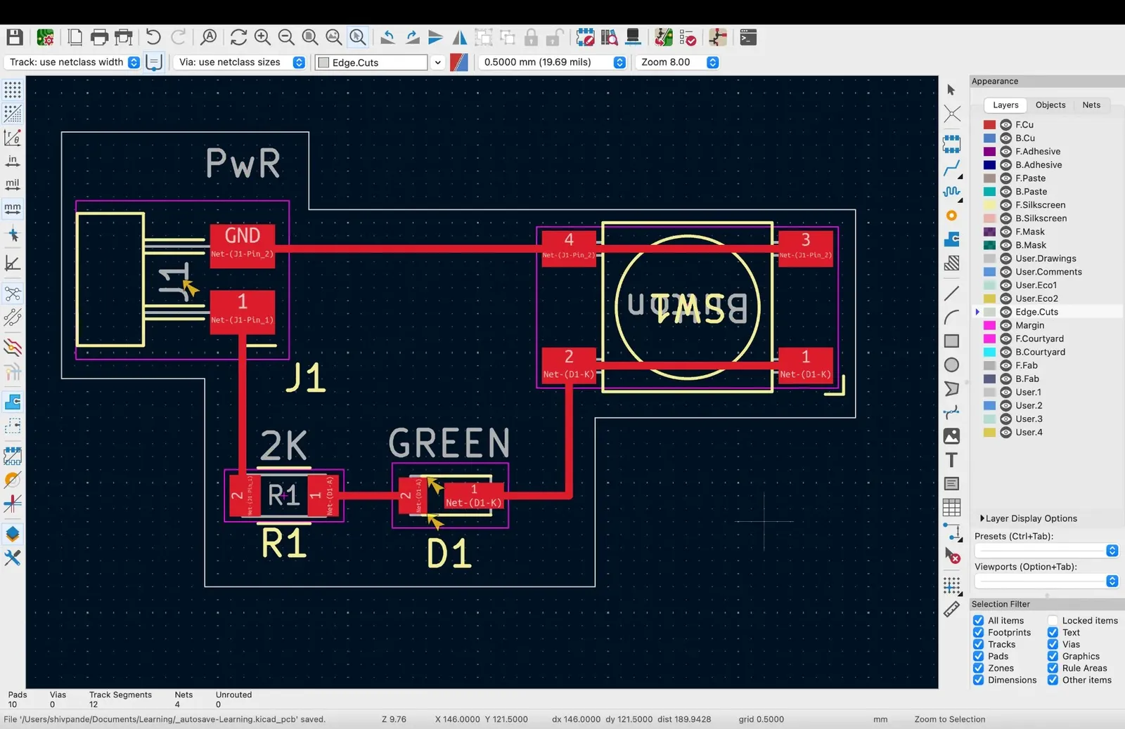Fully routed PCB with red copper traces, 0 unrouted nets
