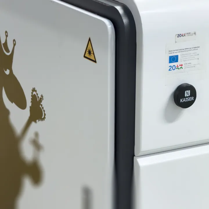 Printed NFC tag attached to Kaiser laser cutter