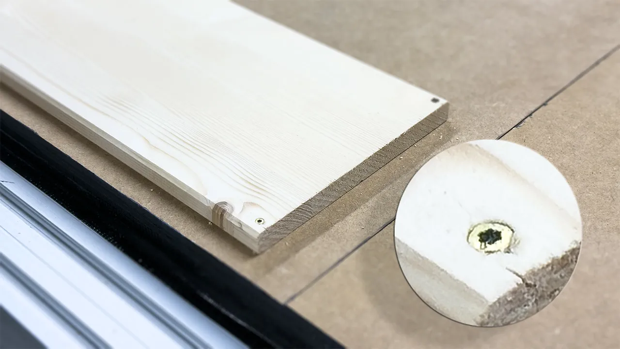 Board secured with screws on the CNC bed