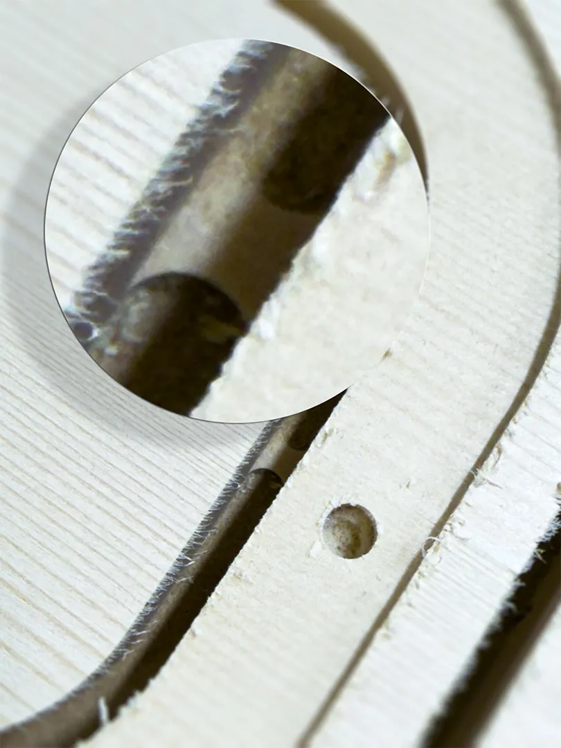 Close-up of milled tabs before removal