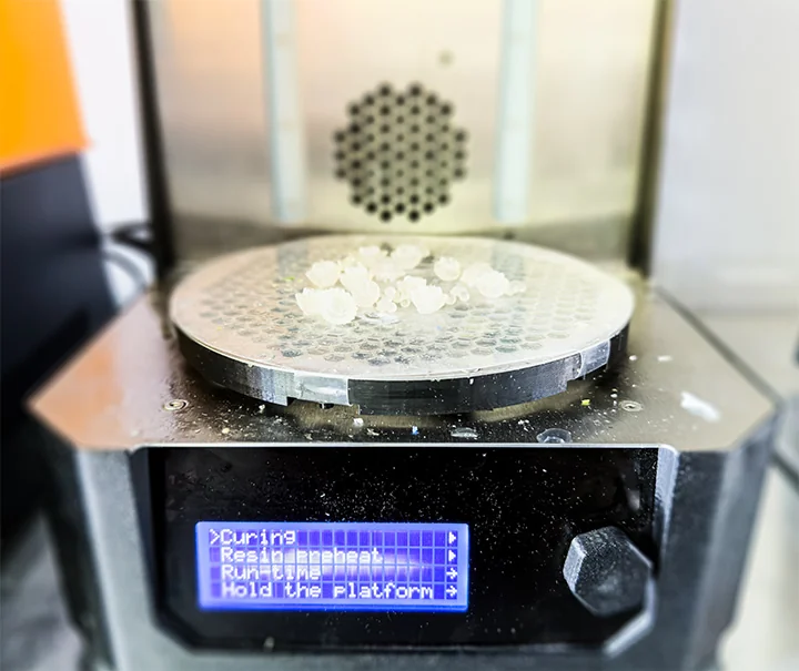 SLA-printed jellyfish parts curing under UV light