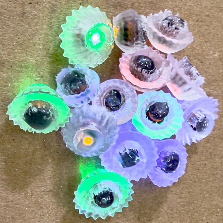 SLA-printed jellyfish with wireless LEDs attached using hot glue