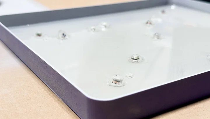 Jellyfish LEDs and bubbles embedded in a fresh epoxy layer