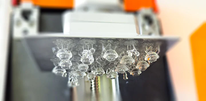 Fresh SLA-printed jellyfish and bubble parts on the build plate