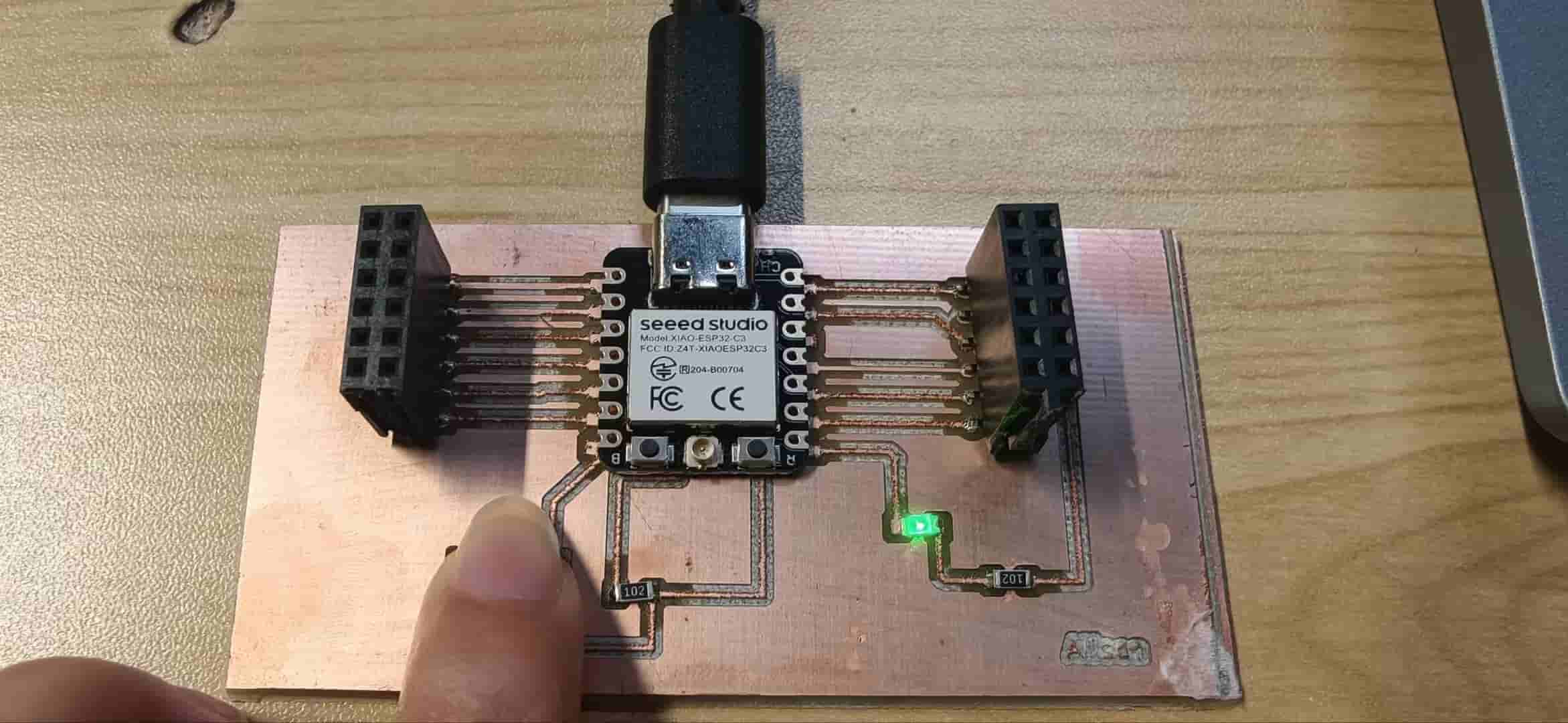 Testing LED and button with code