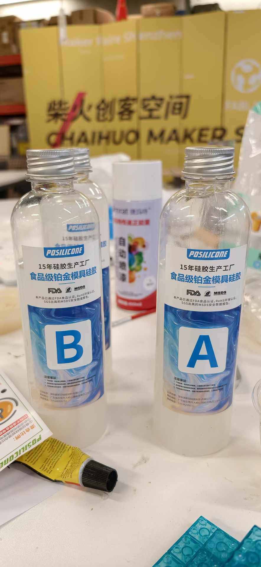 Two-part mold silicone: Part A and Part B bottles