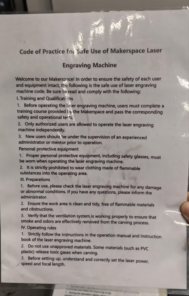 Safety instructions posted near the laser