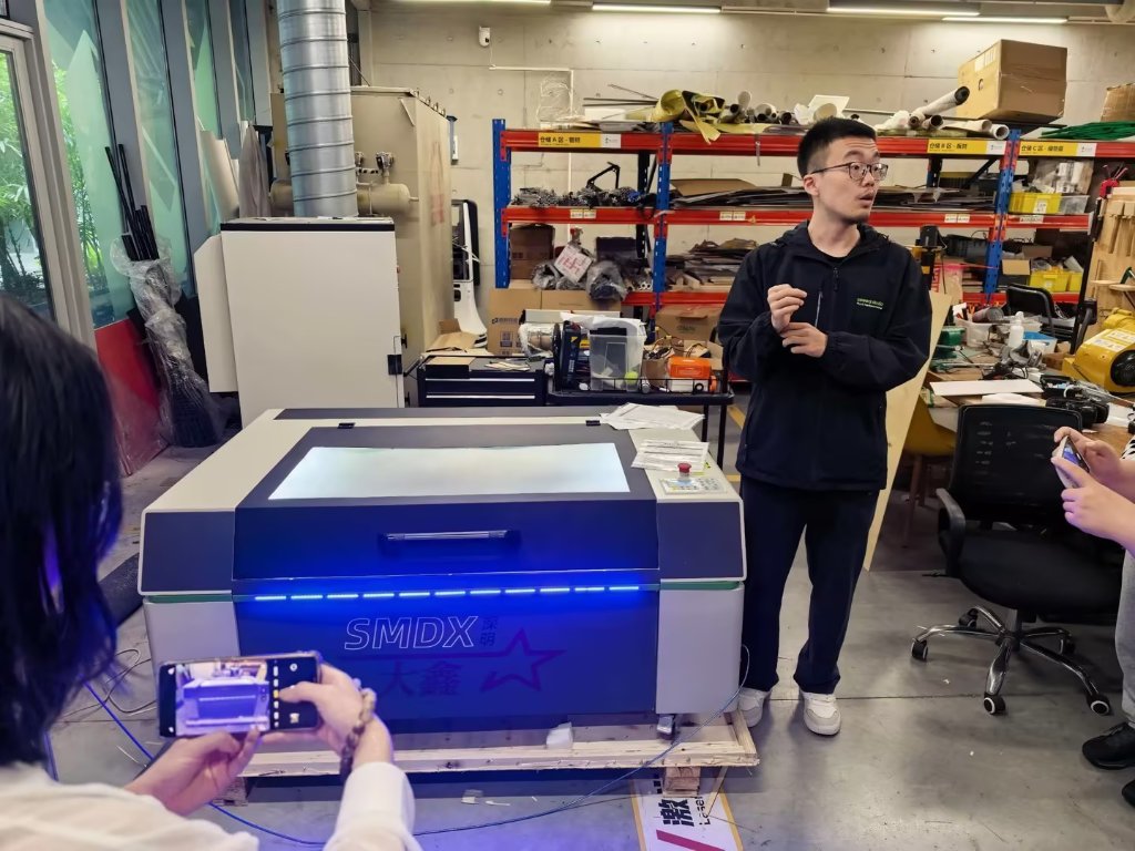 Instructor introducing the laser cutter
