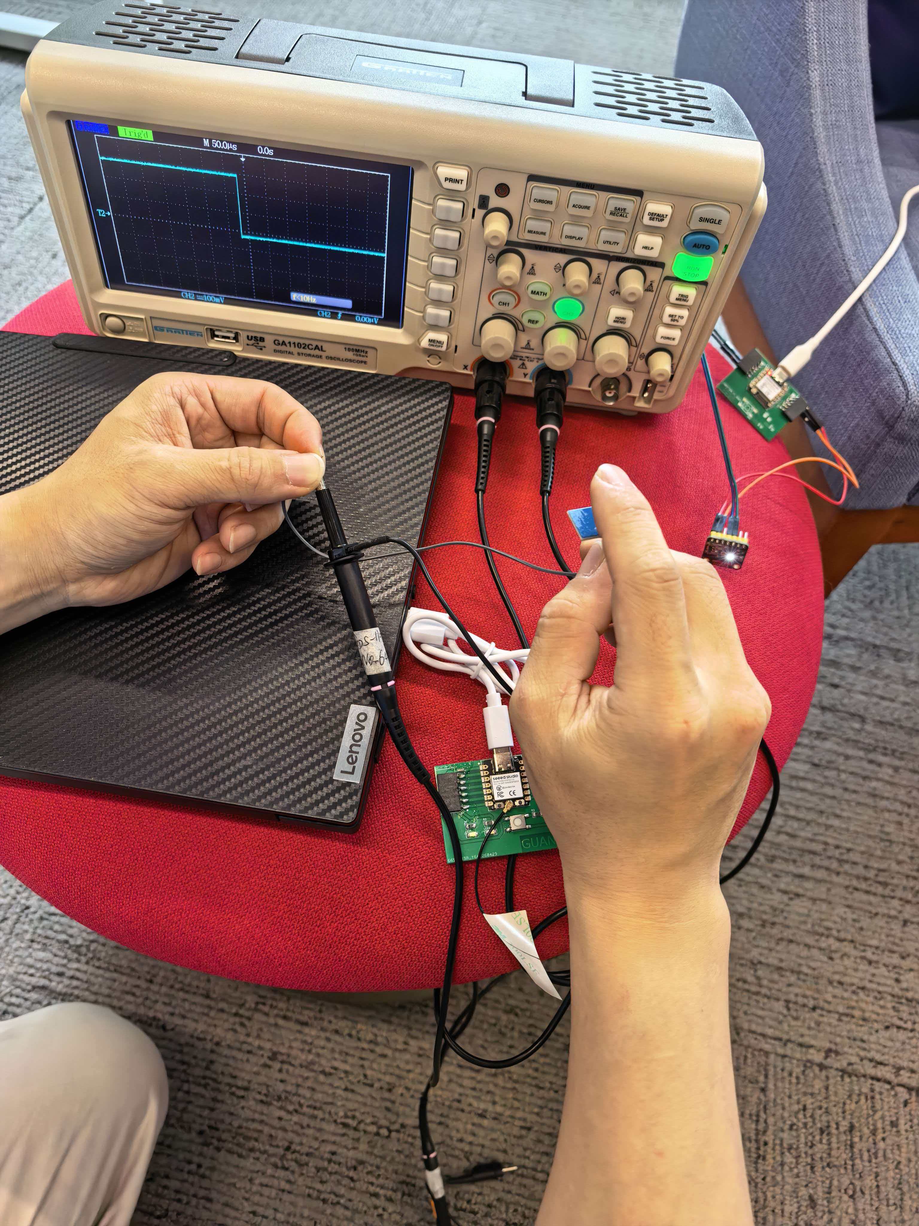 Oscilloscope — TTP223B touch signal on D0 (LOW idle, HIGH while finger on pad)