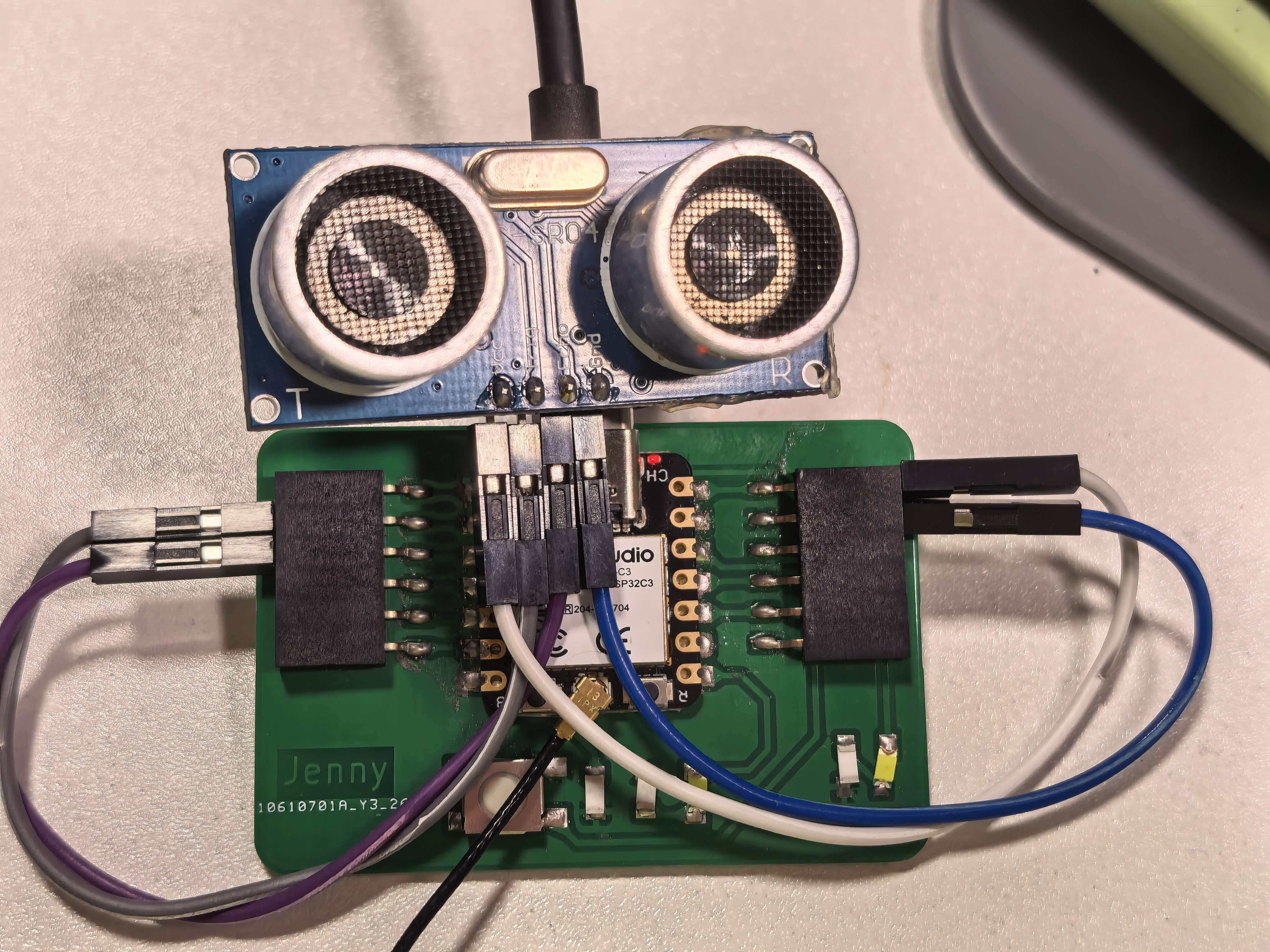 HC-SR04 wired to XIAO ESP32-C3 carrier board