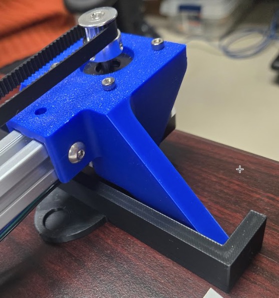 Tilty leg with extra material to block nema motor