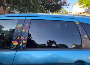 Sailor Moon themed vinyl stickers on the outside of my car windows
