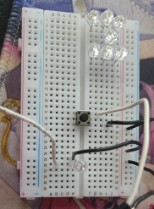 Button and LED wired on a Breadboard