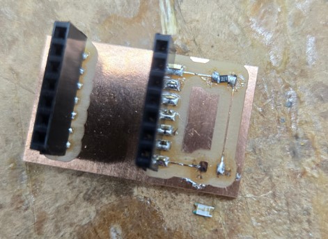 Board showing my desoldered LED and burnt off pad