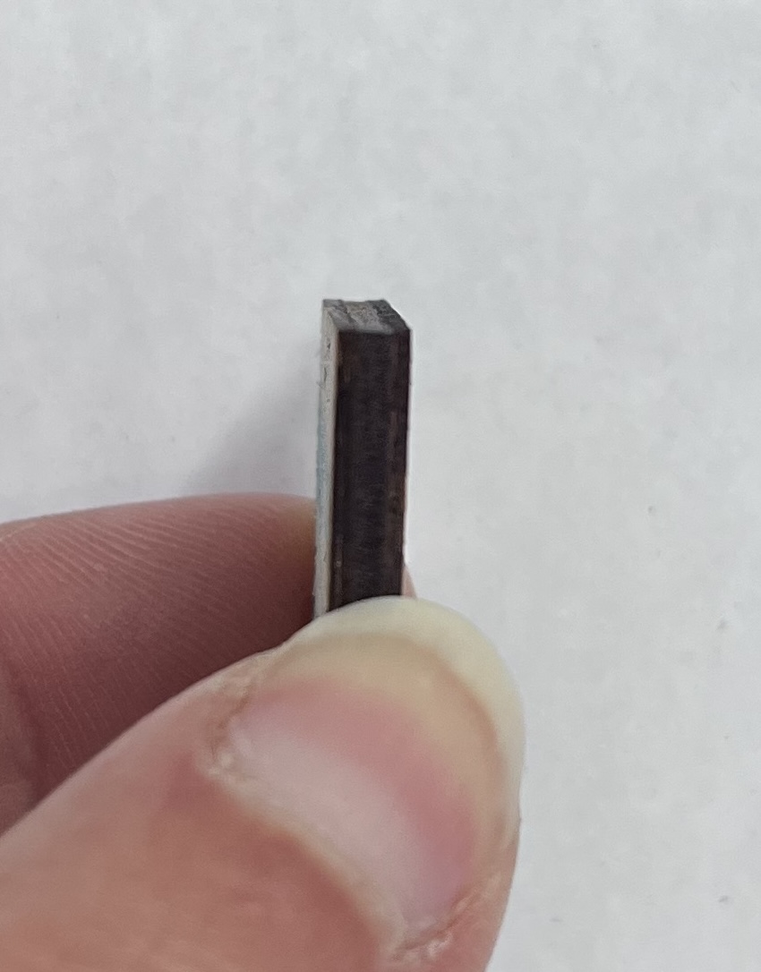 Side view of cut kerf test square