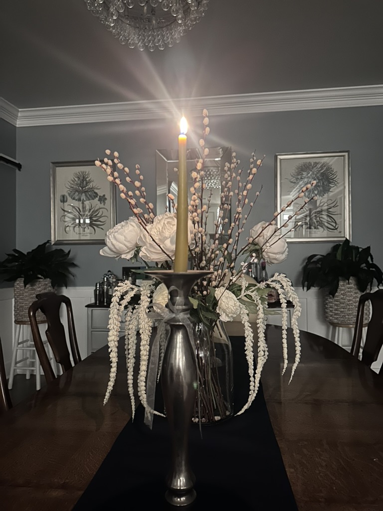 Beeswax candle burning with a steady flame
