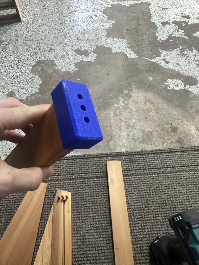 3D printed drill jig on side board