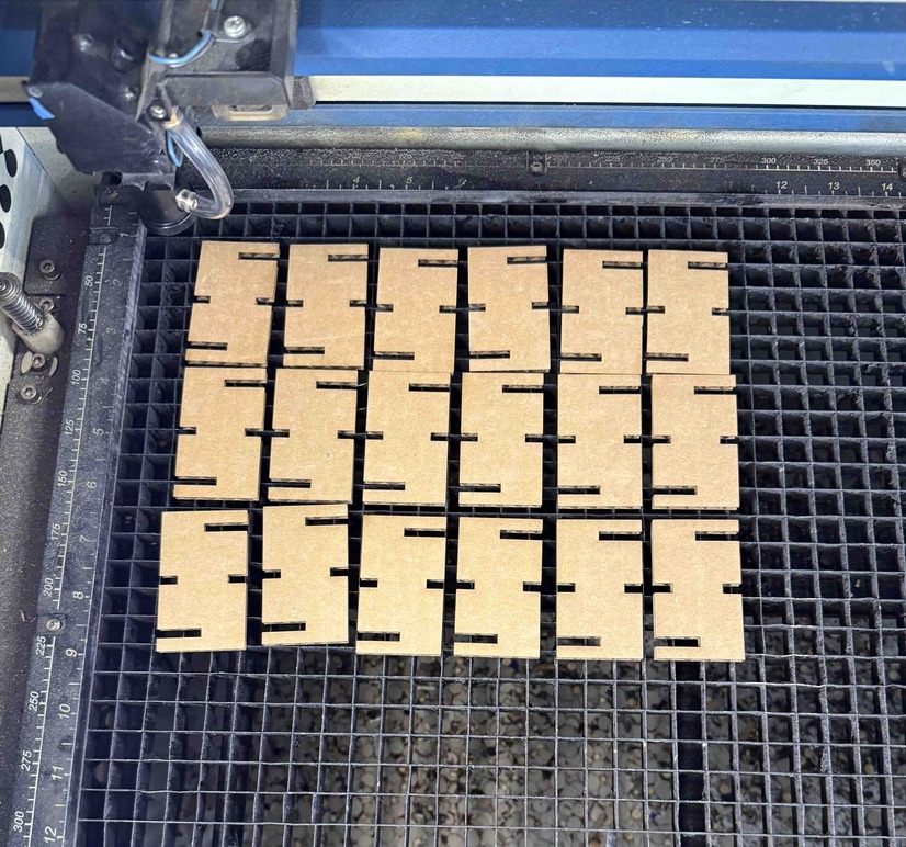 Laser Cut Pieces in Machine