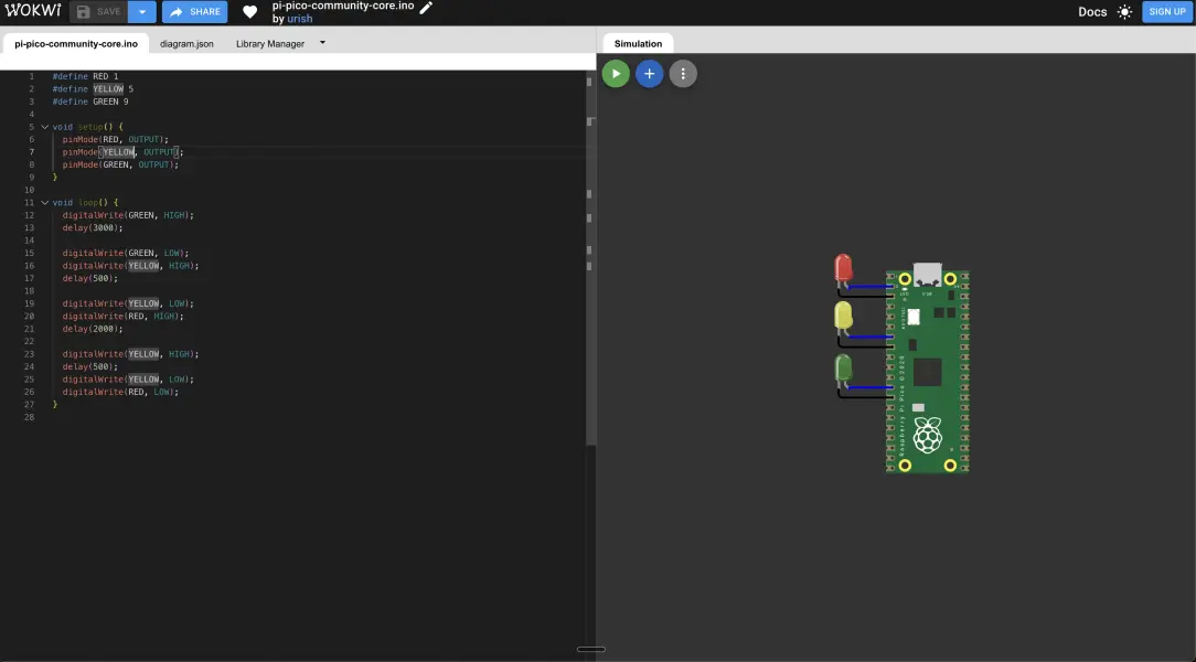 The sketch.ino file showing the traffic light Arduino program with setup() and loop() functions cycling through green, yellow and red LEDs