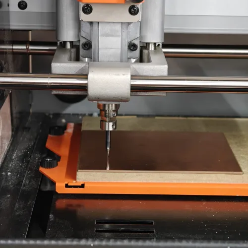 End mill lowered close to the copper board surface for Z-axis zeroing