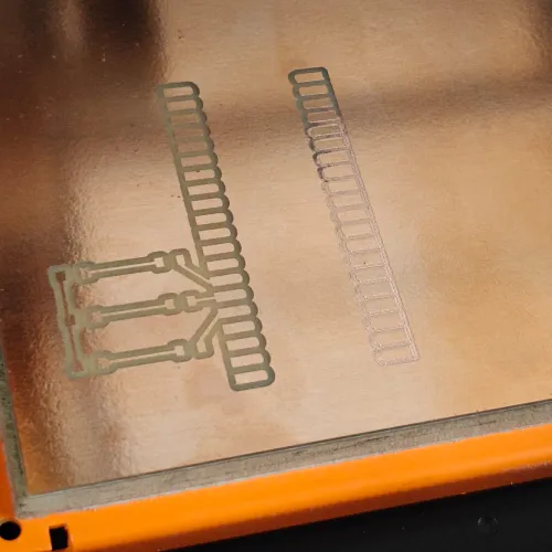 Milled board after hoovering - traces visible but right side pads not cut deep enough