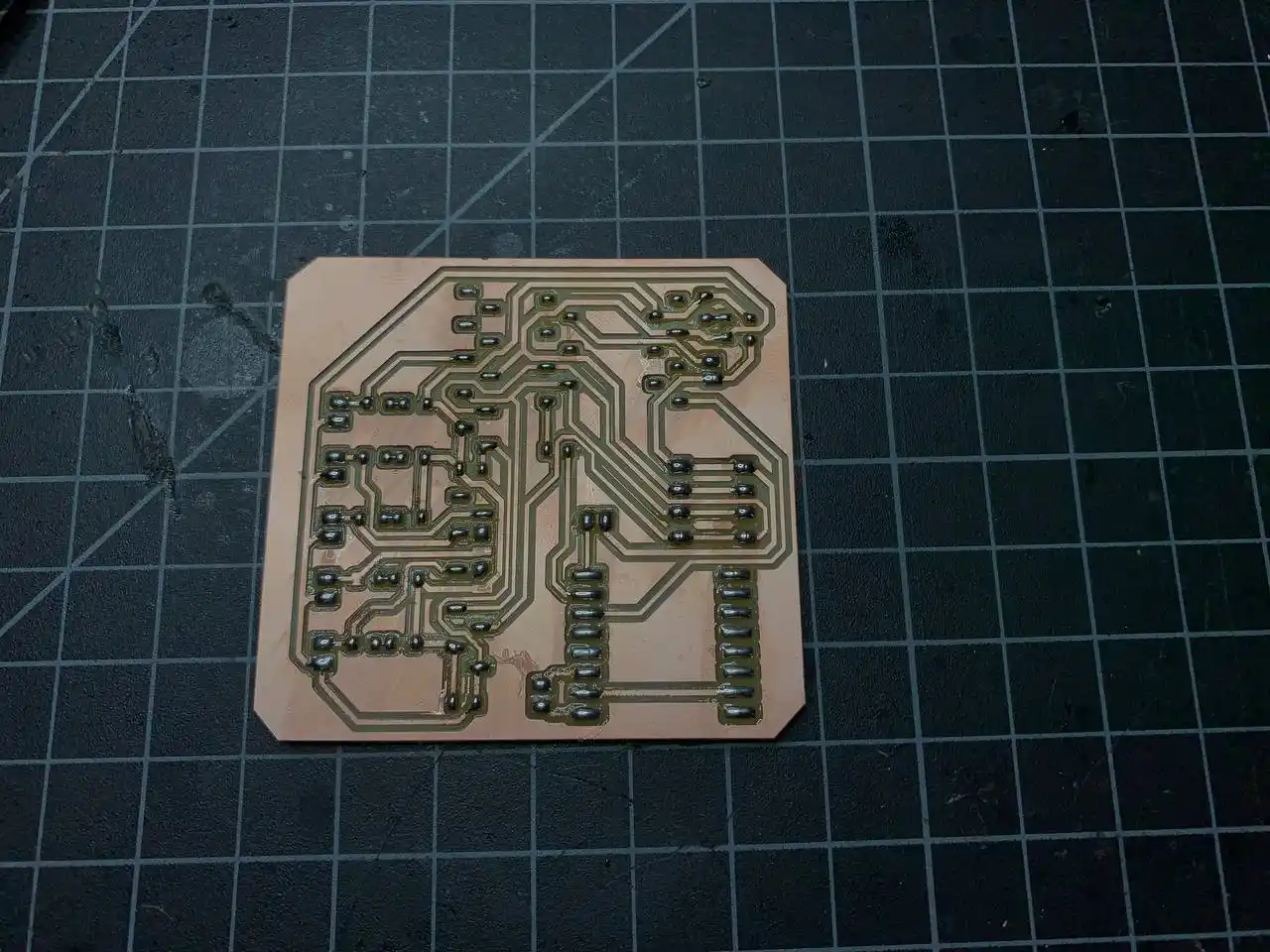 PCB with all SMD resistors, capacitors and LED soldered, pin headers not yet added