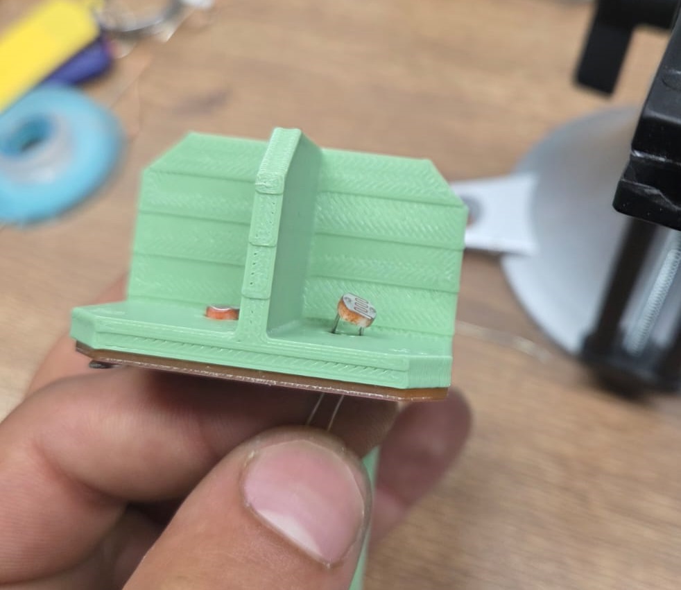 Photoresistors soldered onto the mounted PCB