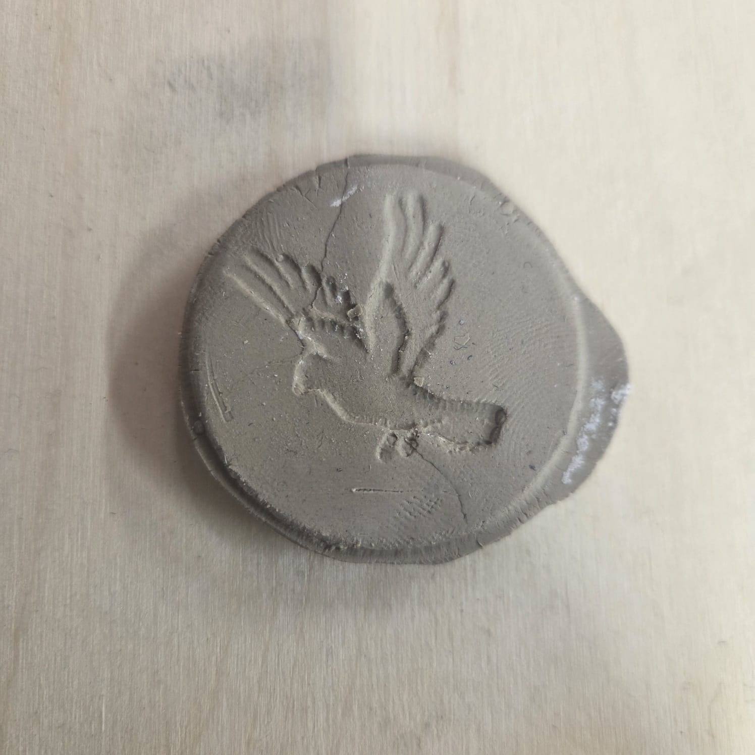 Clay pressed medallion - view 1