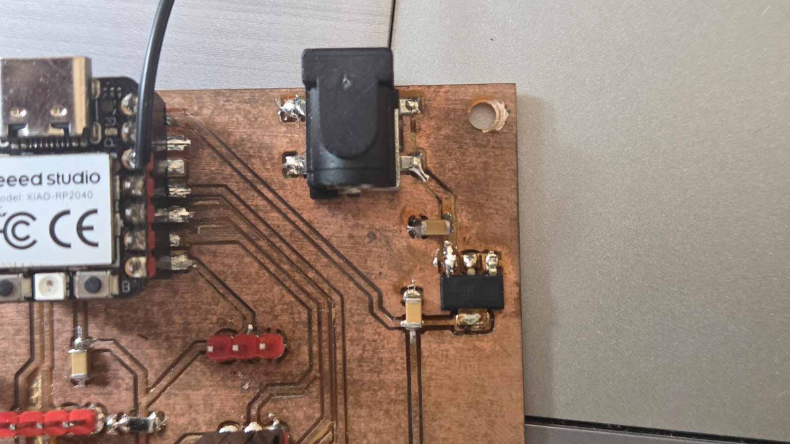Barrel jack and NCP1117 regulator on the Vahan board
