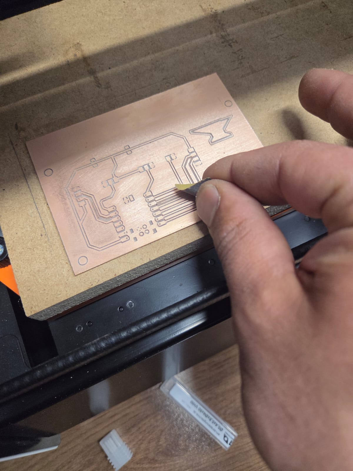 Board after milling — cleaning with brush