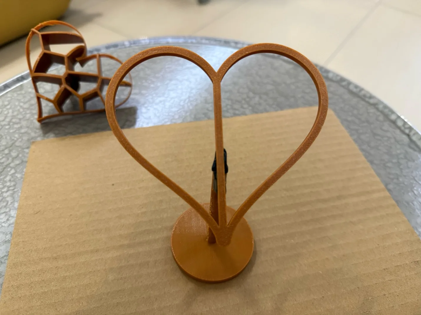 Facial tissue covering the redesigned 3D printed heart frame