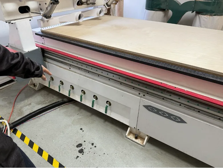 Turning on the vacuum zone valves along the CNC bed