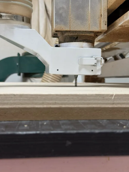 Z-probe sensor positioned near the bit tip