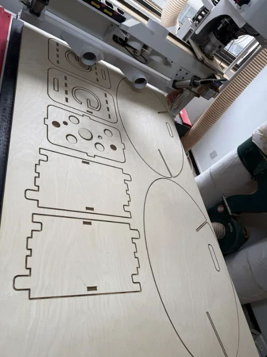 Full plywood sheet loaded on the CNC bed