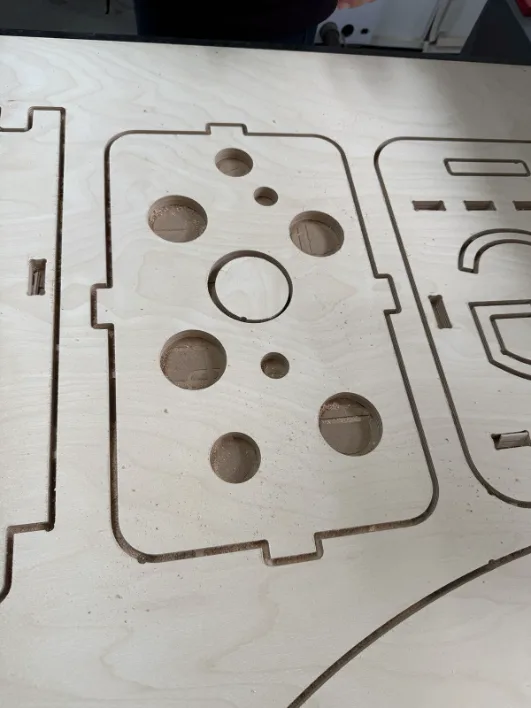 Freshly cut parts still in the sheet