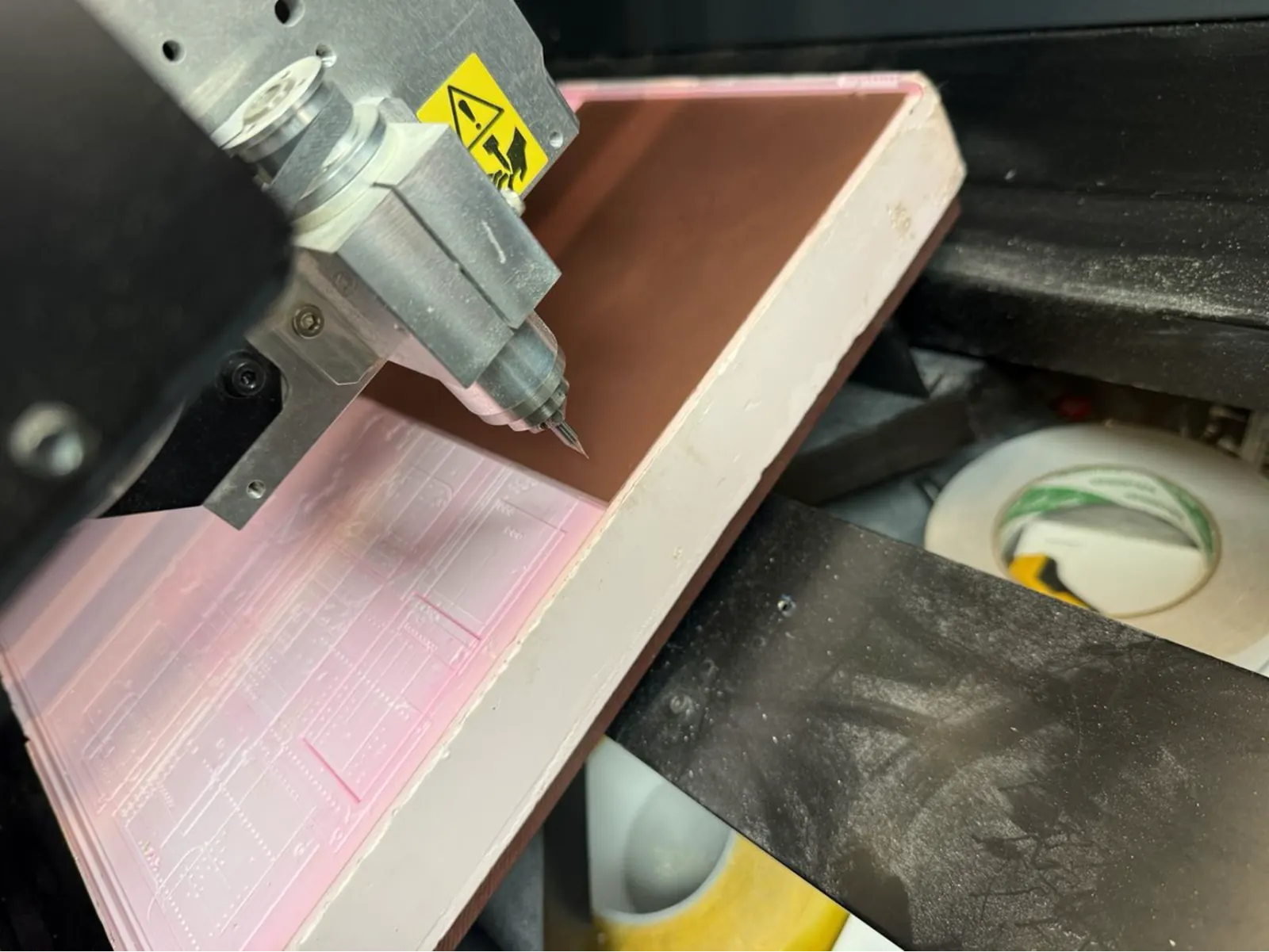 The copper board positioned on the foam – double-sided tape on all corners ensures zero movement during milling