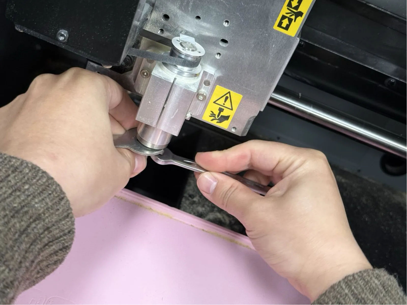Tightening the collet with an open-ended wrench – firm but not over-torqued to avoid collet damage