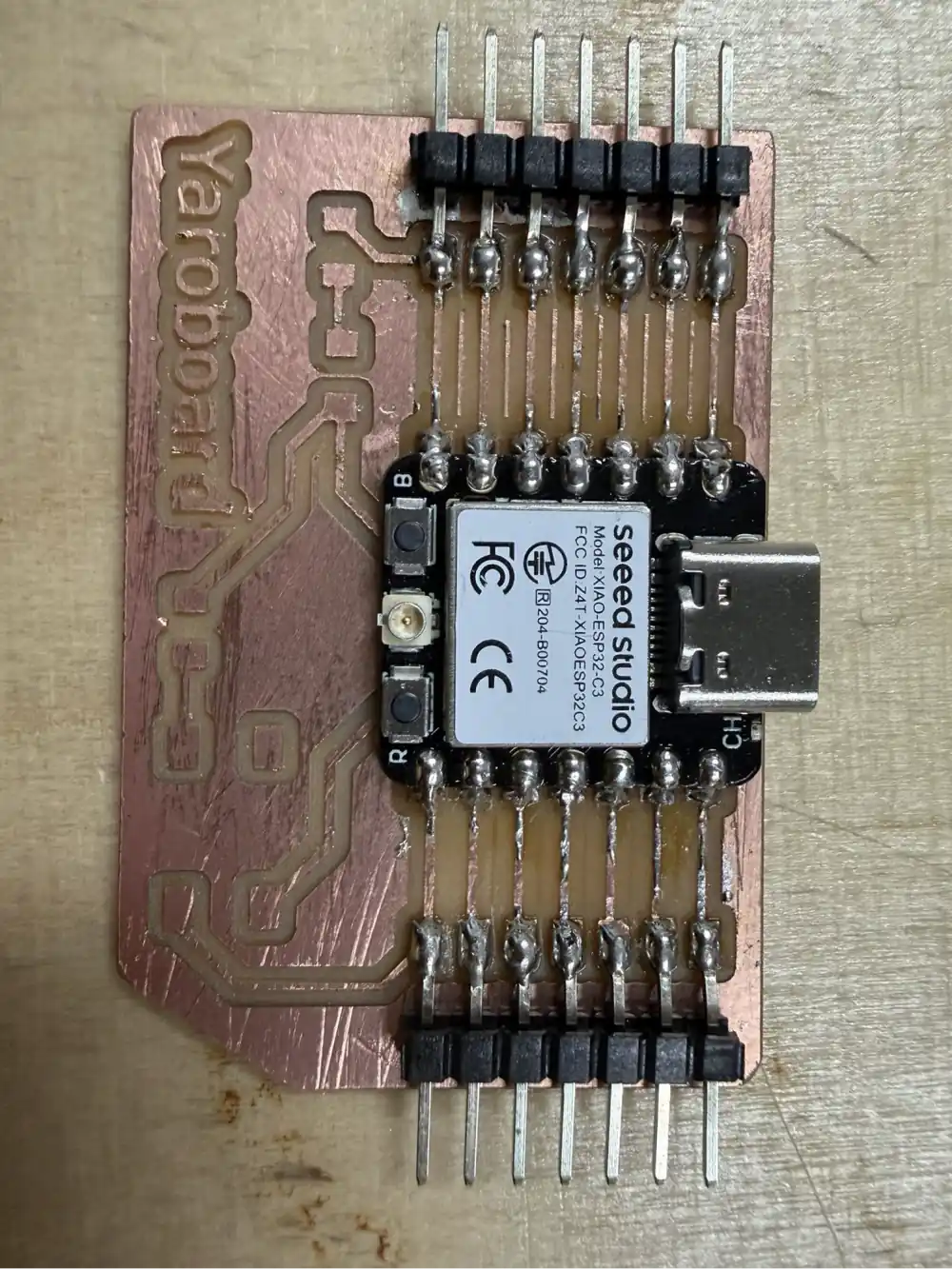 Yaroboard with the XIAO ESP32 C3 module seated and pin headers installed on both sides – ready for final soldering